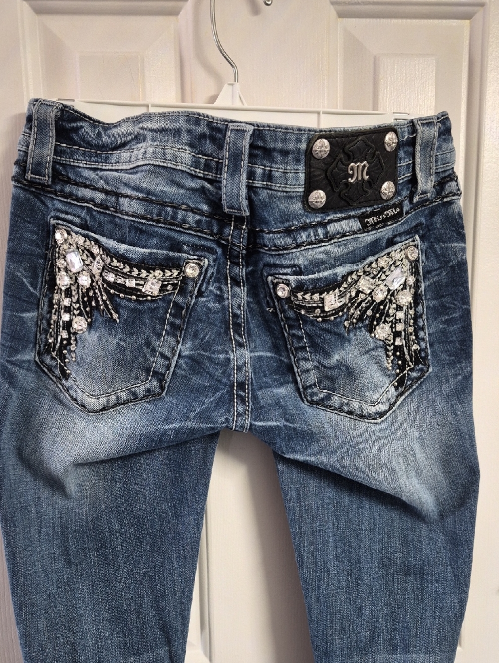 Miss Me Distressed Dark Wash Jeans with Rhinestone Pocket Embellishments